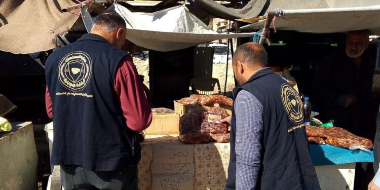 Joint patrols conducted in Al-Thawra neighborhood to regulate markets and remove unauthorized stalls