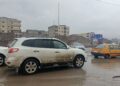 Rainfall in Raqqa reveals deteriorating roads and turn its streets into mud swamps