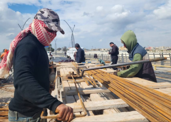 Rapid progress in rehabilitating Raqqa Bridge and the completion of the damaged pillar is approaching